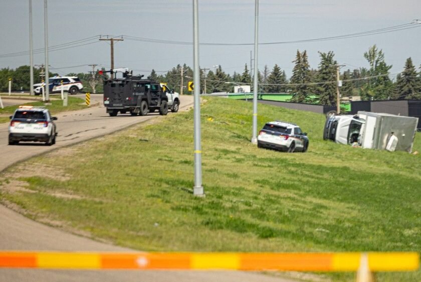 Police fire shots after man hits cruisers during chase in stolen truck