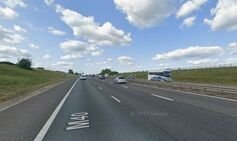 Police storm major UK motorway as lorry driver arrested and 13 people detained