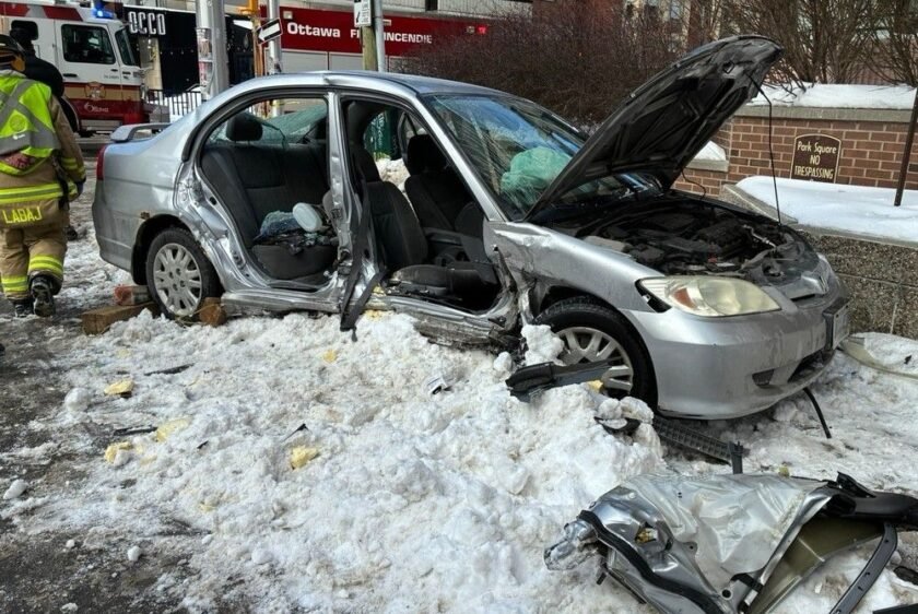 Firefighters free car passenger trapped in downtown crash