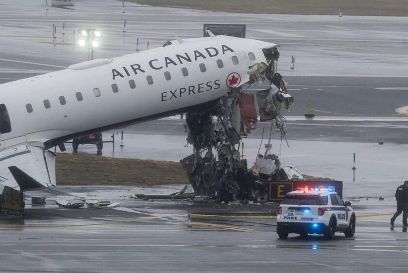 2 pilots killed as plane and fire-rescue truck collide at LaGuardia Airport